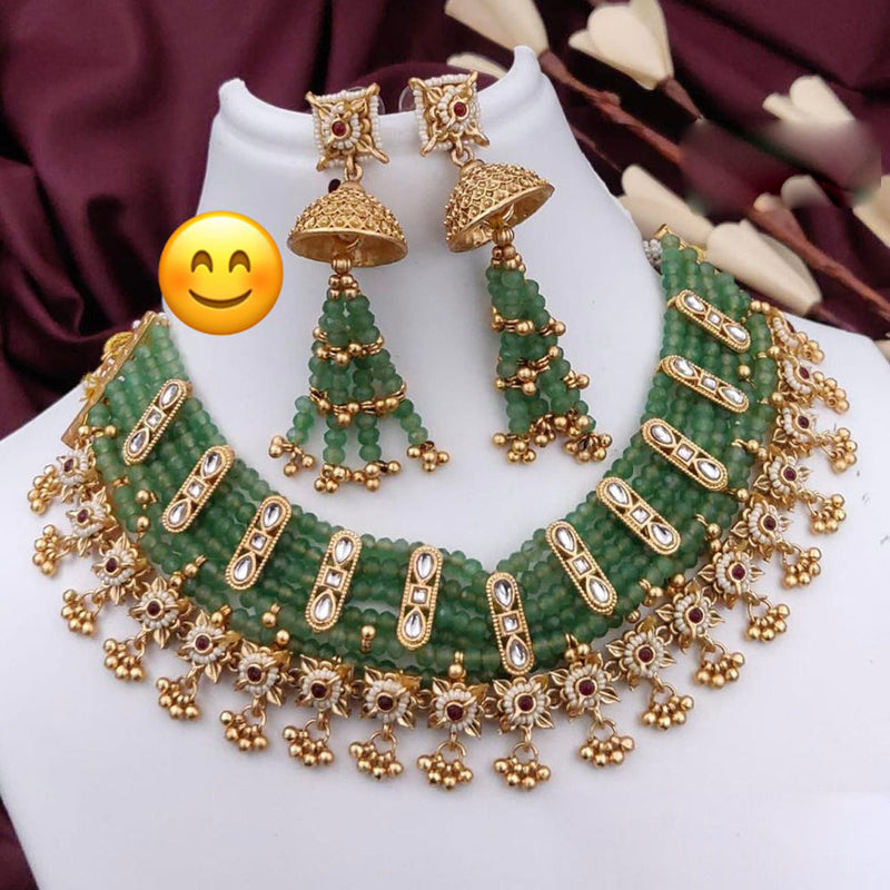 JCM Gold Plated Kundan Stone And Pearls Necklace Set