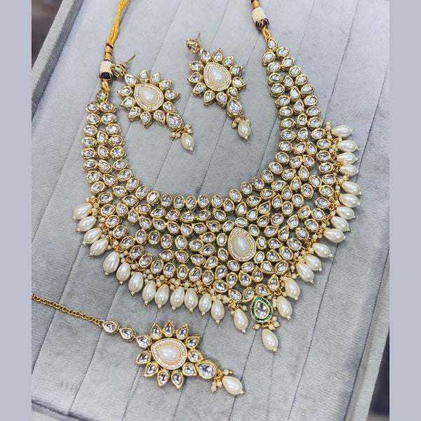 JCM Gold Plated Kundan Stone And Pearls Necklace Set