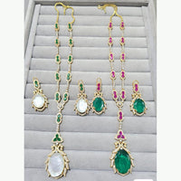 JCM Sparkling Crystal and Polki Kundan Stone Pendent Set