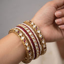 JCM Classic Polki Kundan Stone And Pearl Traditional Bangles Set