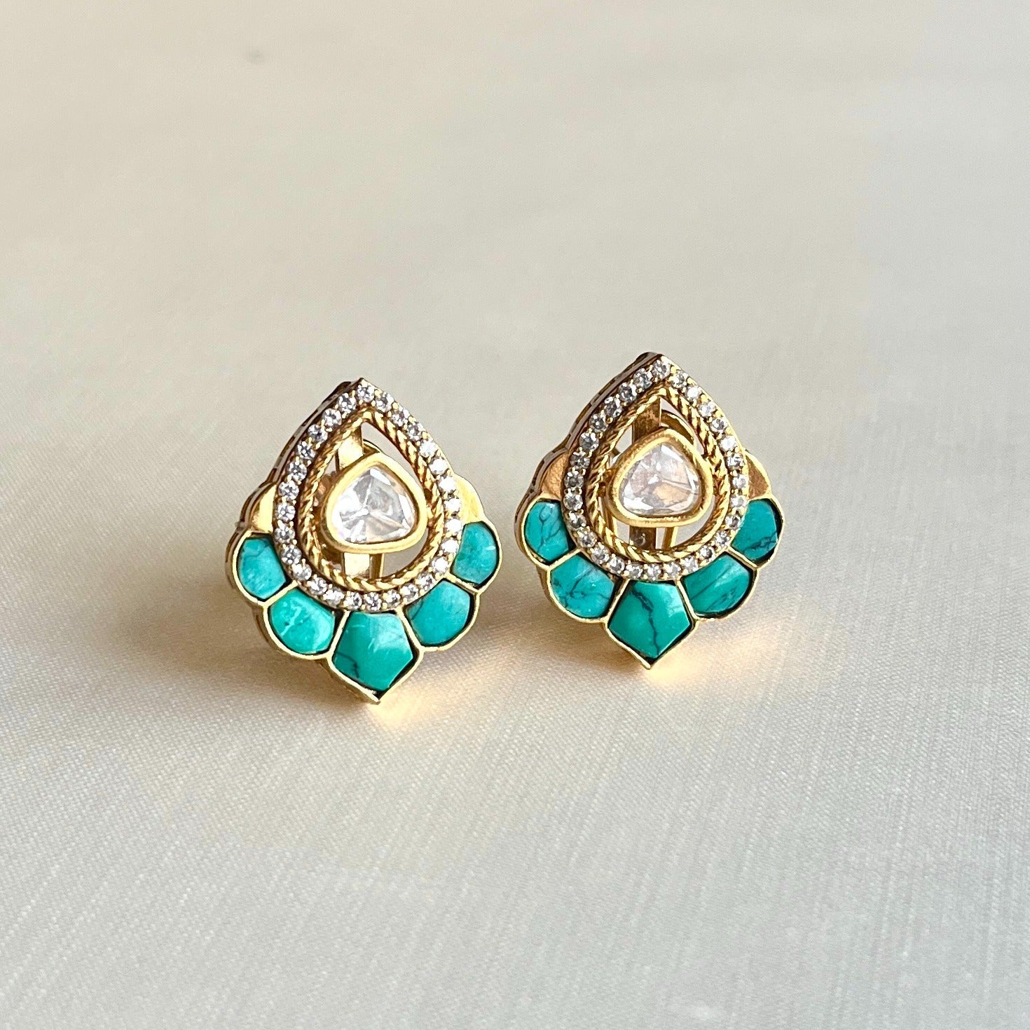 Jewel Treatzz Floral Stud Earrings Gold Plated With Blue Tuquoise , Triangluar Shaped Uncut Polki Kundan Stone Bordered With CZ Stone