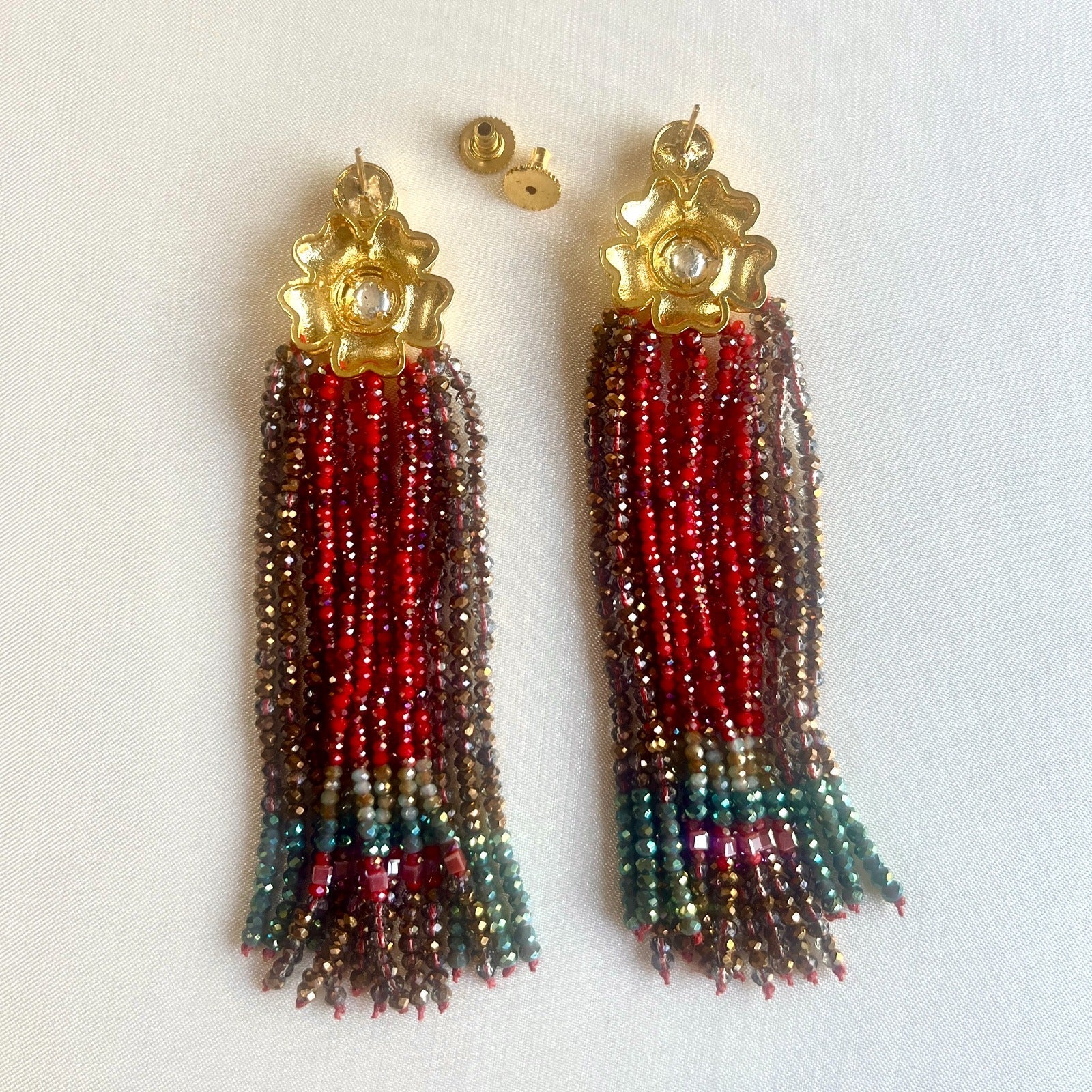 Jewel Treatzz Gold Plated Long Hand enameled Tassel Earrings Eith Kundan & Green Agate Crystals