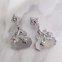 Jewel Treatzz Rhodium Plated, Pear Shaped Emerald Doublet Stone & Cubic Zirconia's Dangler Earrings (Pack of 10)