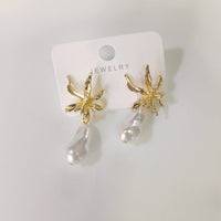 Tarohi Jewels Gold Plated Pearl Dangler Earrings