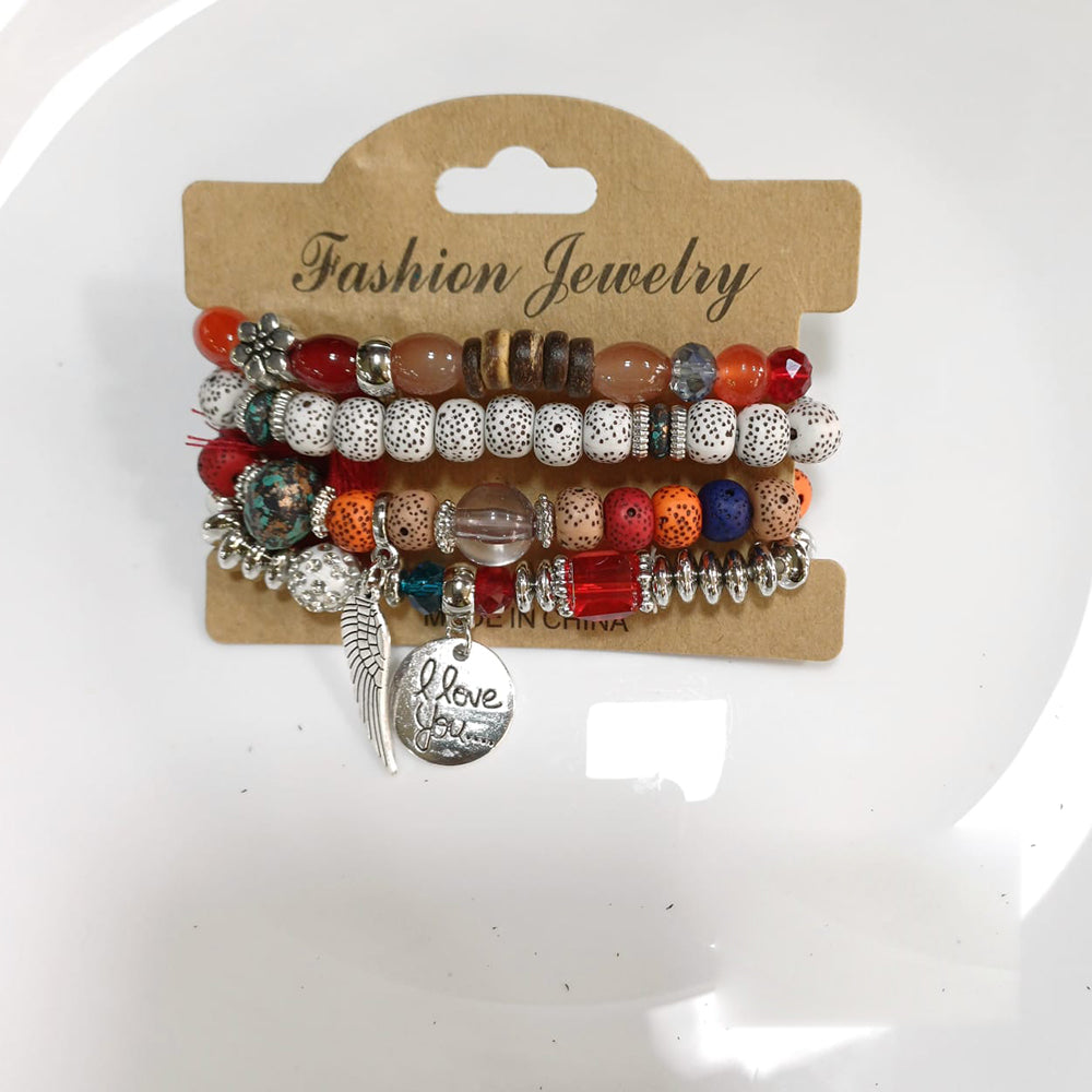 Tarohi Jewels Beach-Inspired Shell And Charm Beads Bracelet
