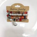 Tarohi Jewels Beach-Inspired Shell And Charm Beads Bracelet