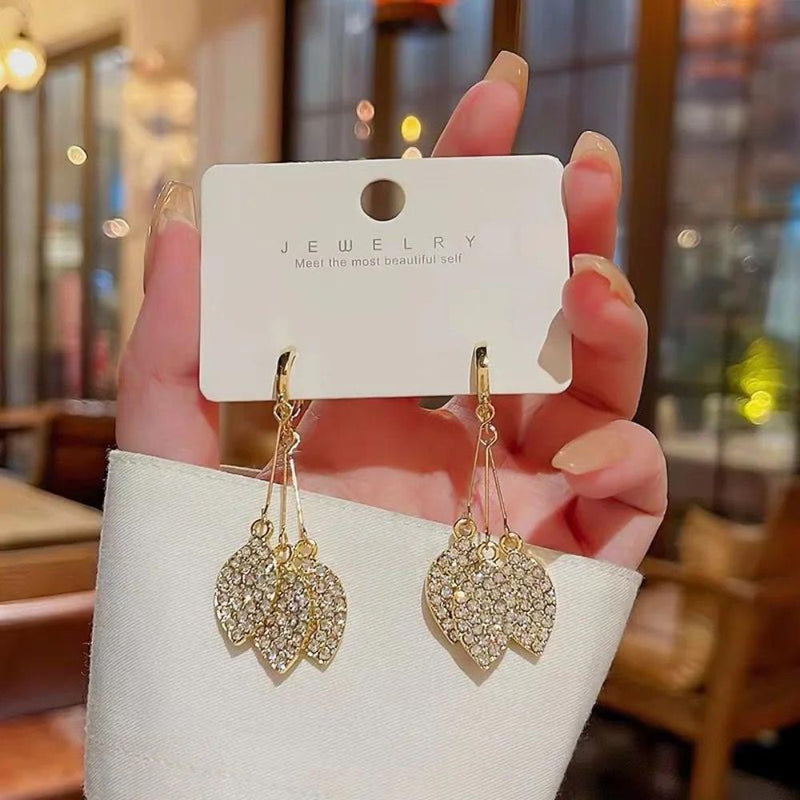 Glam Jewellery Gold Electroplated Rhinestone Studded High End Leaf Tassel Earrings