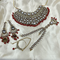 The Fashion Jewels Elegant Kundan Stone And Pearl Semi Bridal Necklace Set