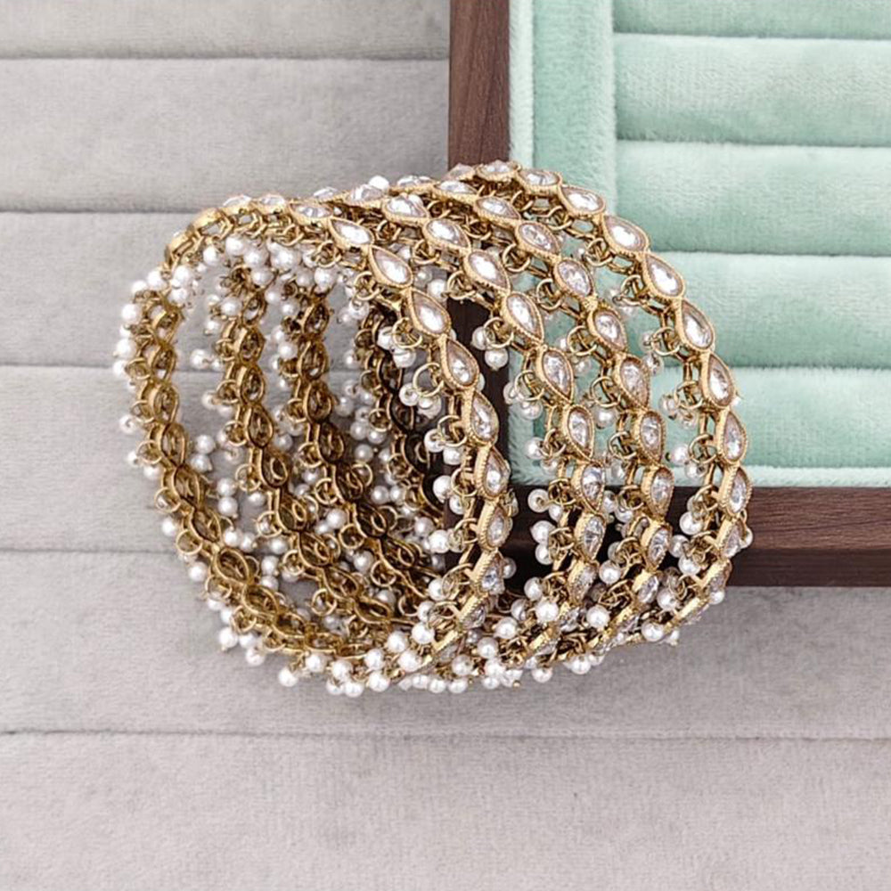 Rajwadi Collection Shimmer Crystal Stone And Pearl Bangles Set