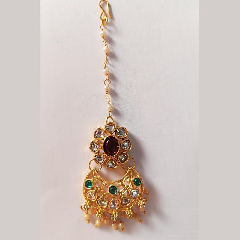 Disha Imitation Gold Plated Austrian Stone And Pearls Mangtikka