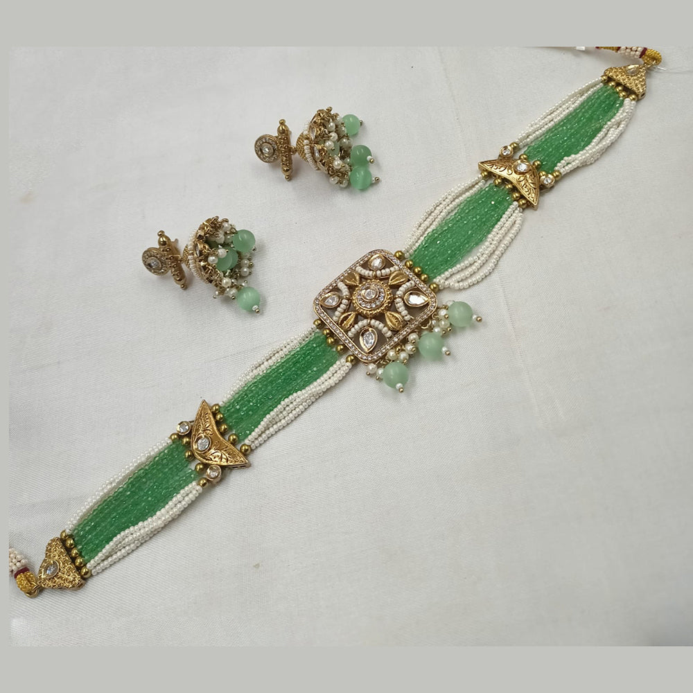 NAFJ Gold-Plated Kundan And Pearl  Elegant Bridal & Festive Jewelry Choker Necklace Set