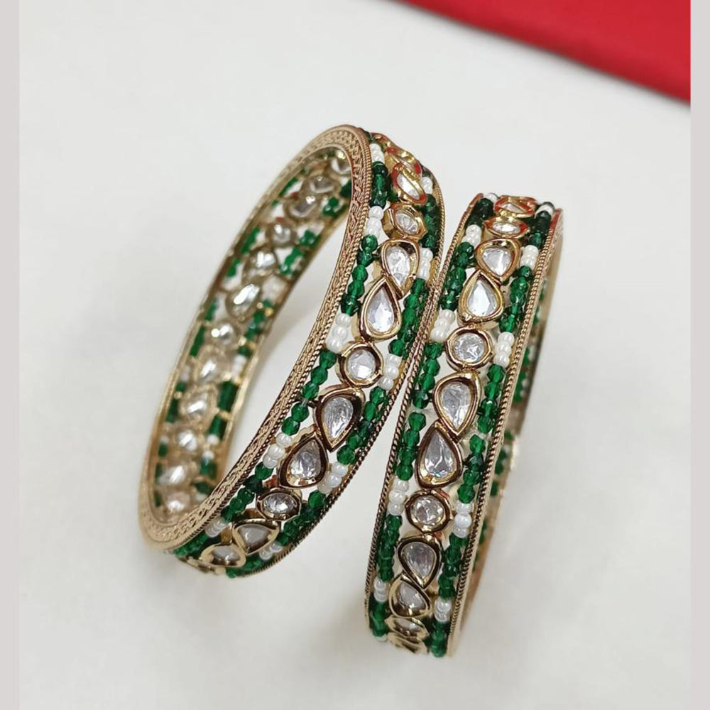 NAFJ Gold Plated Polki Kundan Stone And Pearl Bangles Set