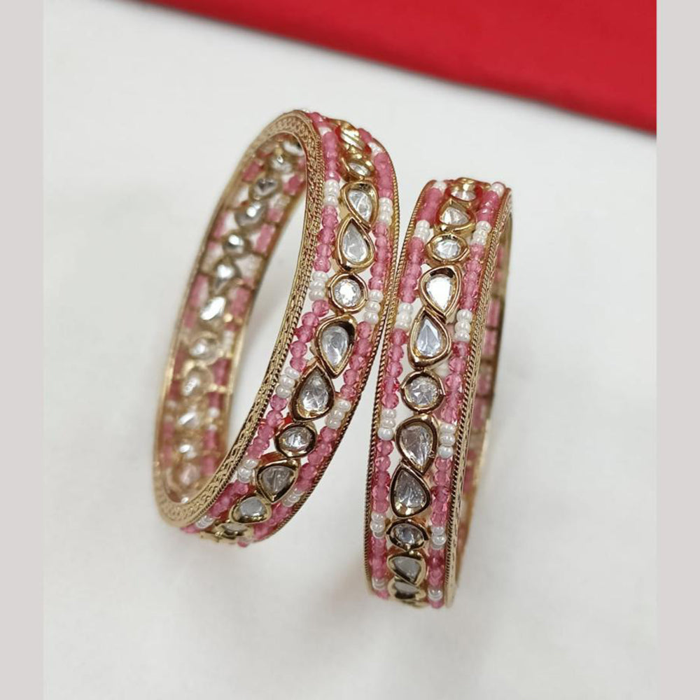 NAFJ Gold Plated Polki Kundan Stone And Pearl Bangles Set