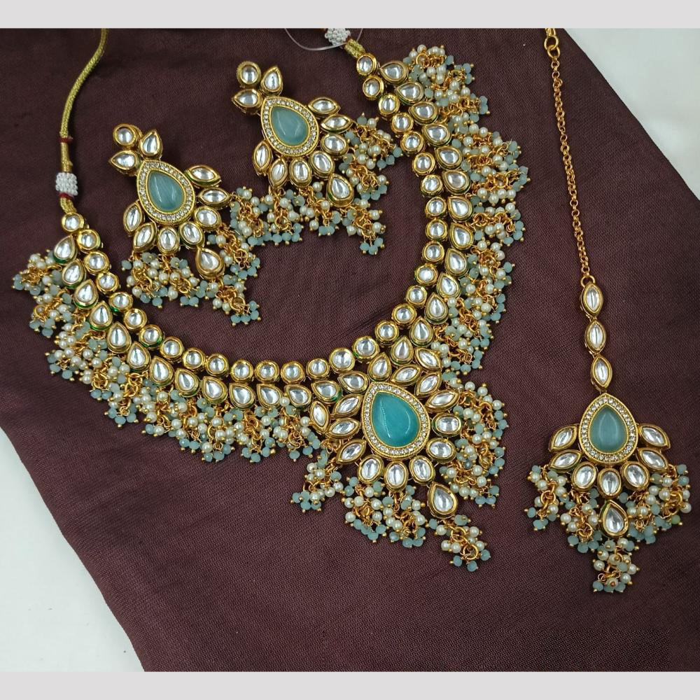 NAFJ Exquisite Kundan Necklace Set with Blue Stone Accents