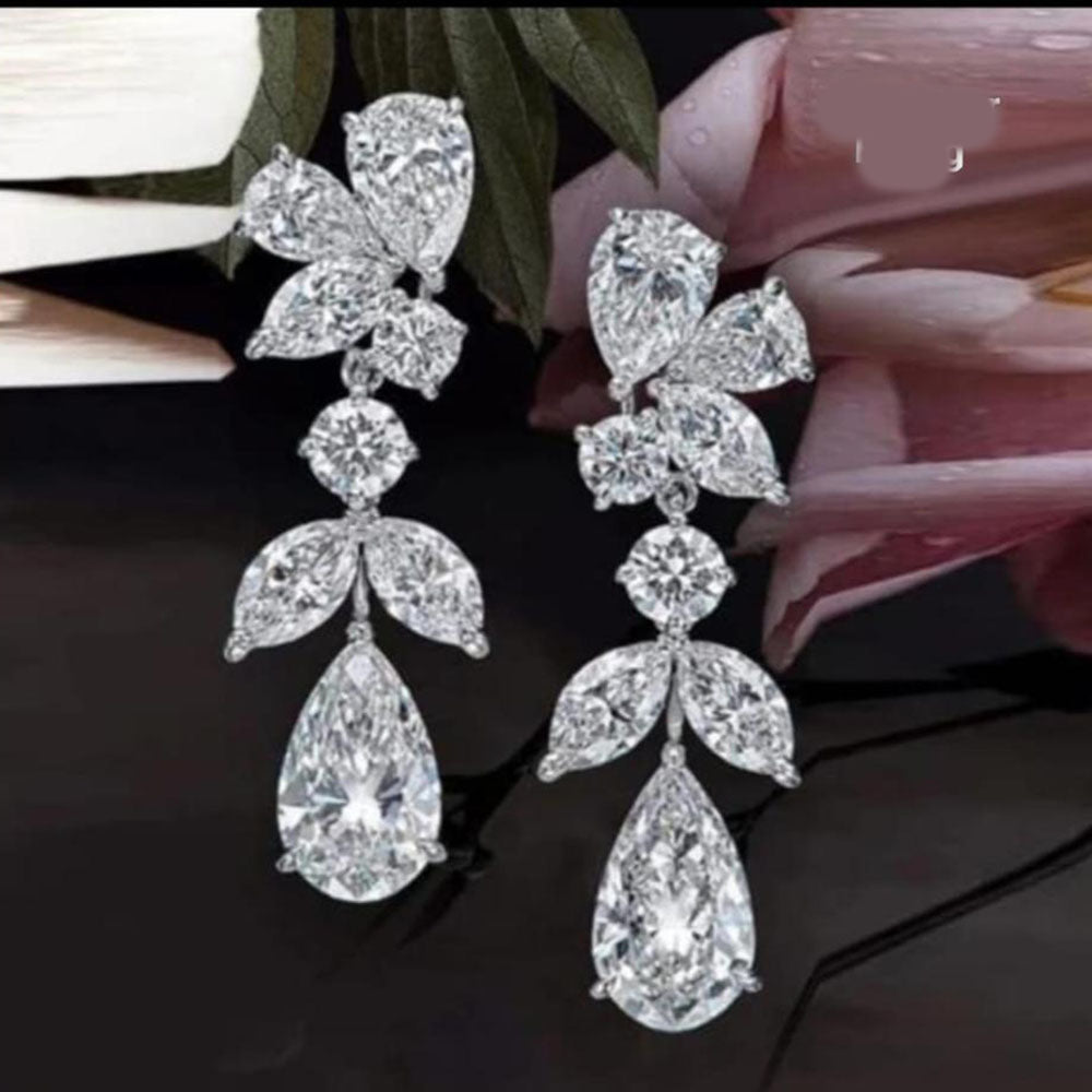 NAFJ Glam Drop  AD Dangler Earrings in Rhodium Finish
