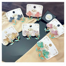 Klitz Cute Flower Blossom Studs Earrings (Assorted Color)