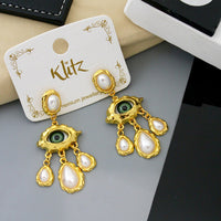 Klitz Trendy Artistic Eye Design Dangler Earrings