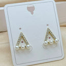 Klitz Stylish Stainless Steel Austrian Stone And Pearl Studs Earrings