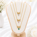 Klitz Stunning Gold Plated Crystal Stone Bow Chain Pendant