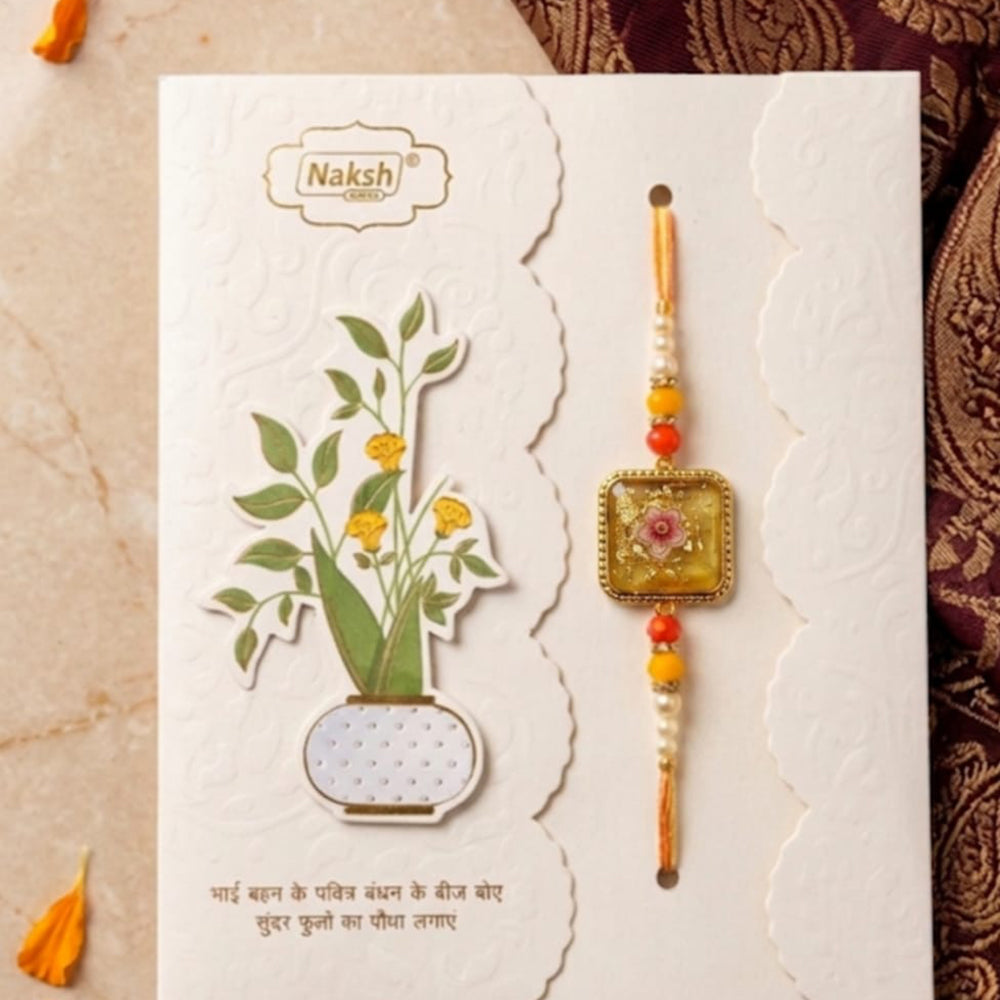 Dhirish International Thread Rakhi for a Memorable and Spiritually Rich Celebration