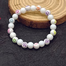 Urthn OM White Beads Bracelet (Pack Of 6)
