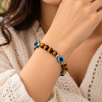 Urthn Trendy Tiger Beads Bracelet with Evil Eye Charms for Women & Men's(Pack Of 3 )