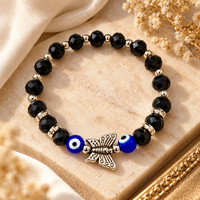 Urthn Trendy Black and Evil Eye Beads Bracelet with Butterfly Charm for Women(Pack Of 3 )