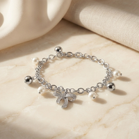 Urthn Fashionable Silver Plated With Bow Shape Charm Bracelet with Pearl Drops