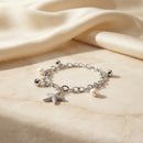 Urthn Fashionable Silver Plated With Star Fish Shape Charm Bracelet with Pearl Drops(Pack Of 6)