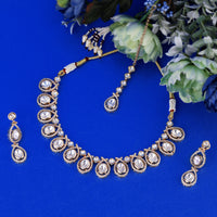 Saloni Fashion Jewellery Glimmery Oval and Round Shape Uncut Kundan Stone 18 KT Gold Plated Brass Choker Necklace Set with Maang Tikka For Women and Girls