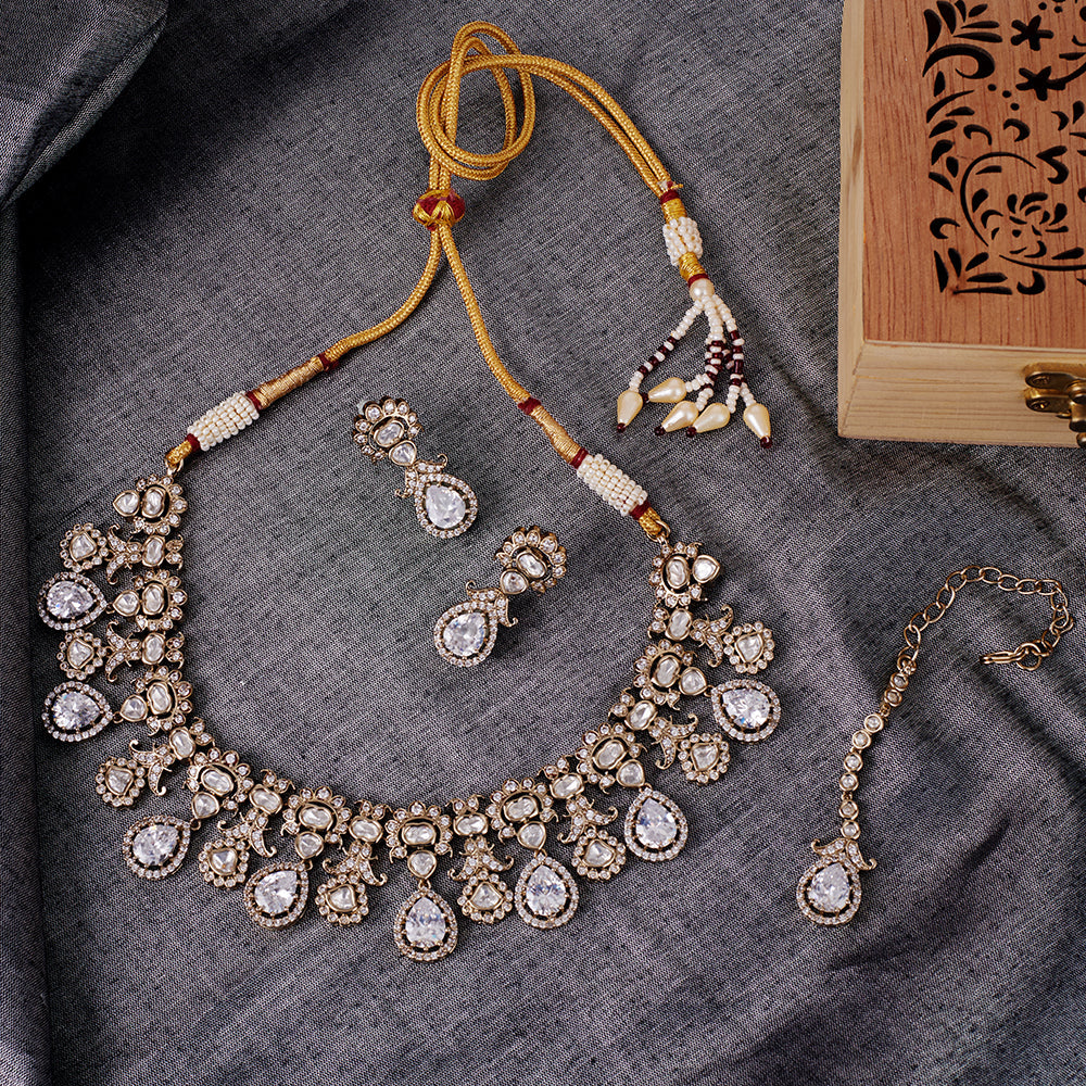 Saloni Fashion Jewellery Elegant Oval Shape Uncut Kundan Stone Gold Plated Brass Choker Necklace Set With Maang Tikka For Women and Girls