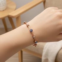 Etnico Rose Gold Plated Fashion Stylish Evil Eye Cable Bracelet with Magnetic Lock for Women