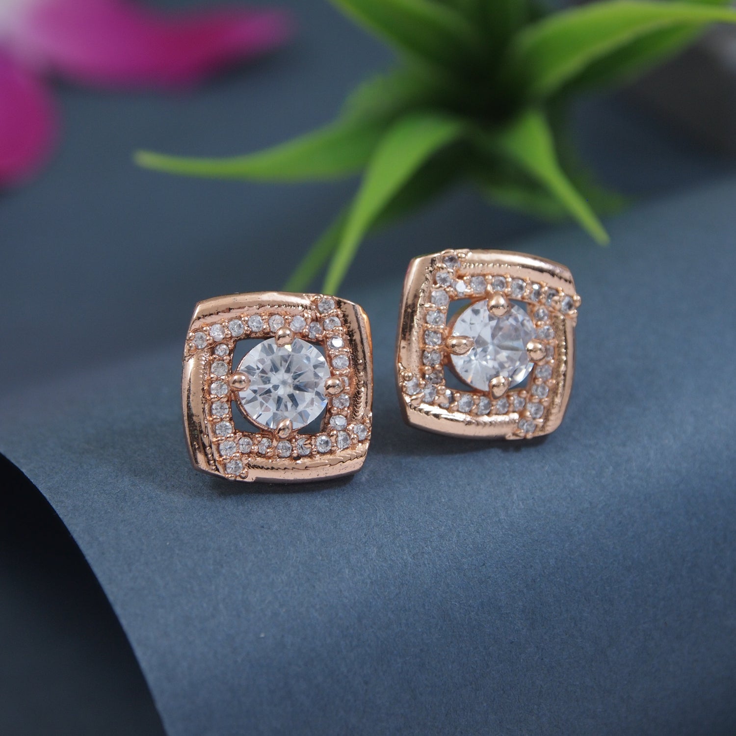 Etnico Latest Stylish Rose Gold Plated CZ American Diamond Stud Earrings For Women