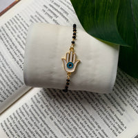 Etnico Gold Plated Traditional Adjustable Black Beads Mangalsutra Bracelet with White Pendant for Women (MB003B)