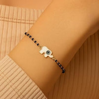 Etnico Gold Plated Traditional Adjustable Black Beads Mangalsutra Bracelet with White Pendant for Women (MB005B)
