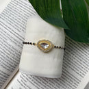 Etnico Gold Plated Traditional Adjustable Black Beads Mangalsutra Bracelet with White Pendant for Women (MB009W)