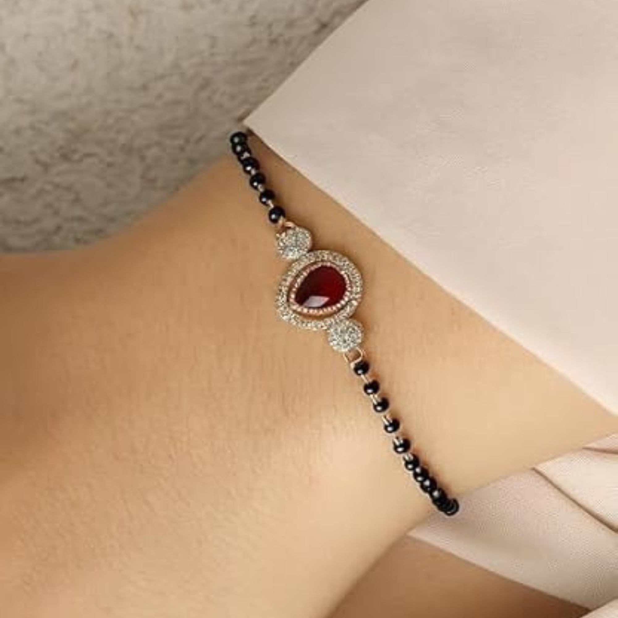 Etnico Gold Plated Traditional Adjustable Black Beads Mangalsutra Bracelet with White Pendant for Women (MB010Q)