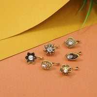 Etnico Gold Plated Traditional Ethnic Set of 6 Nose Pins Without Piercing Encased with Stones for Women (NL191FL-CO)