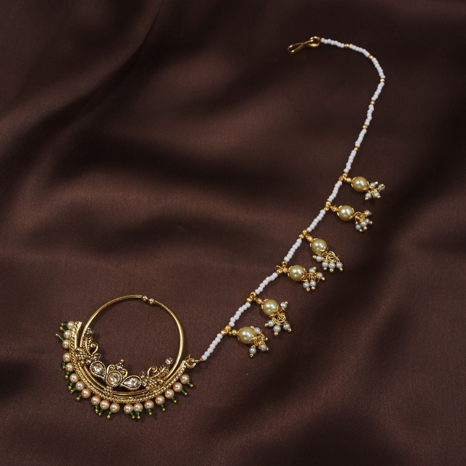 Etnico Gold Plated Traditional Ethnic Bridal Nose Ring/Nath without piercing with Pearl Chain Encased with Pearl Stone for Women/Girls (NL39G)