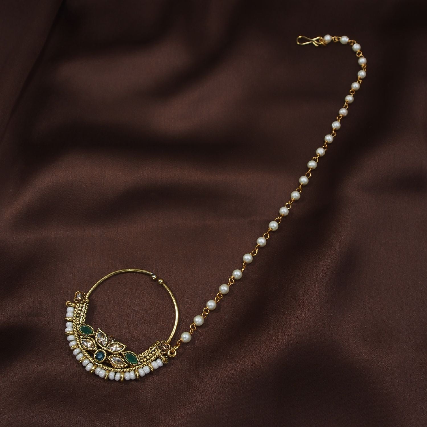 Etnico 18k Gold Plated Traditional Ethnic Bridal Nose Ring/Nath without piercing with Pearl Chain Encased with Pearl Stone for Women/Girls (NL41G)
