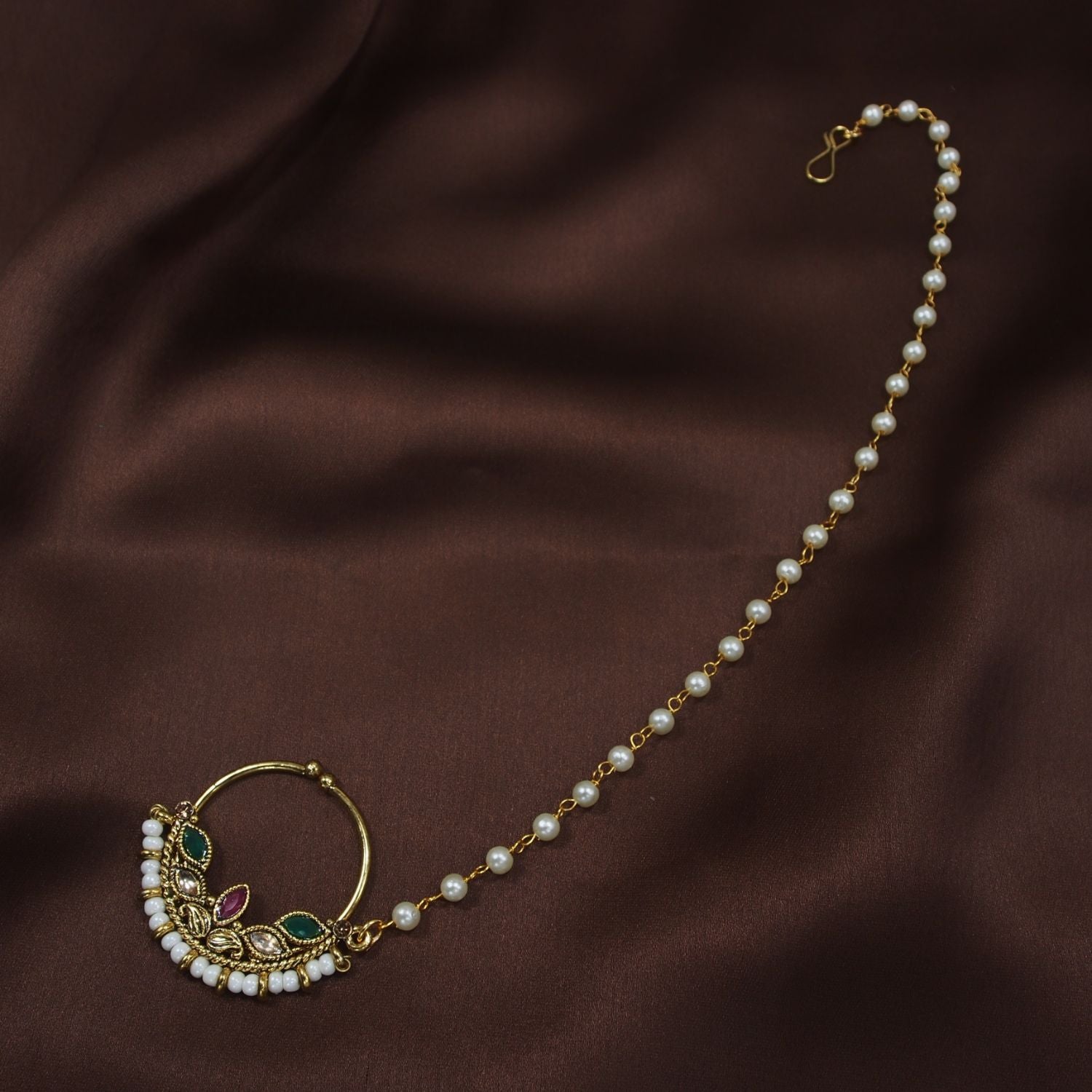 Etnico 18k Gold Plated Traditional Ethnic Bridal Nose Ring/Nath without piercing with Pearl Chain Encased with Pearl Stone for Women/Girls (NL47QG)