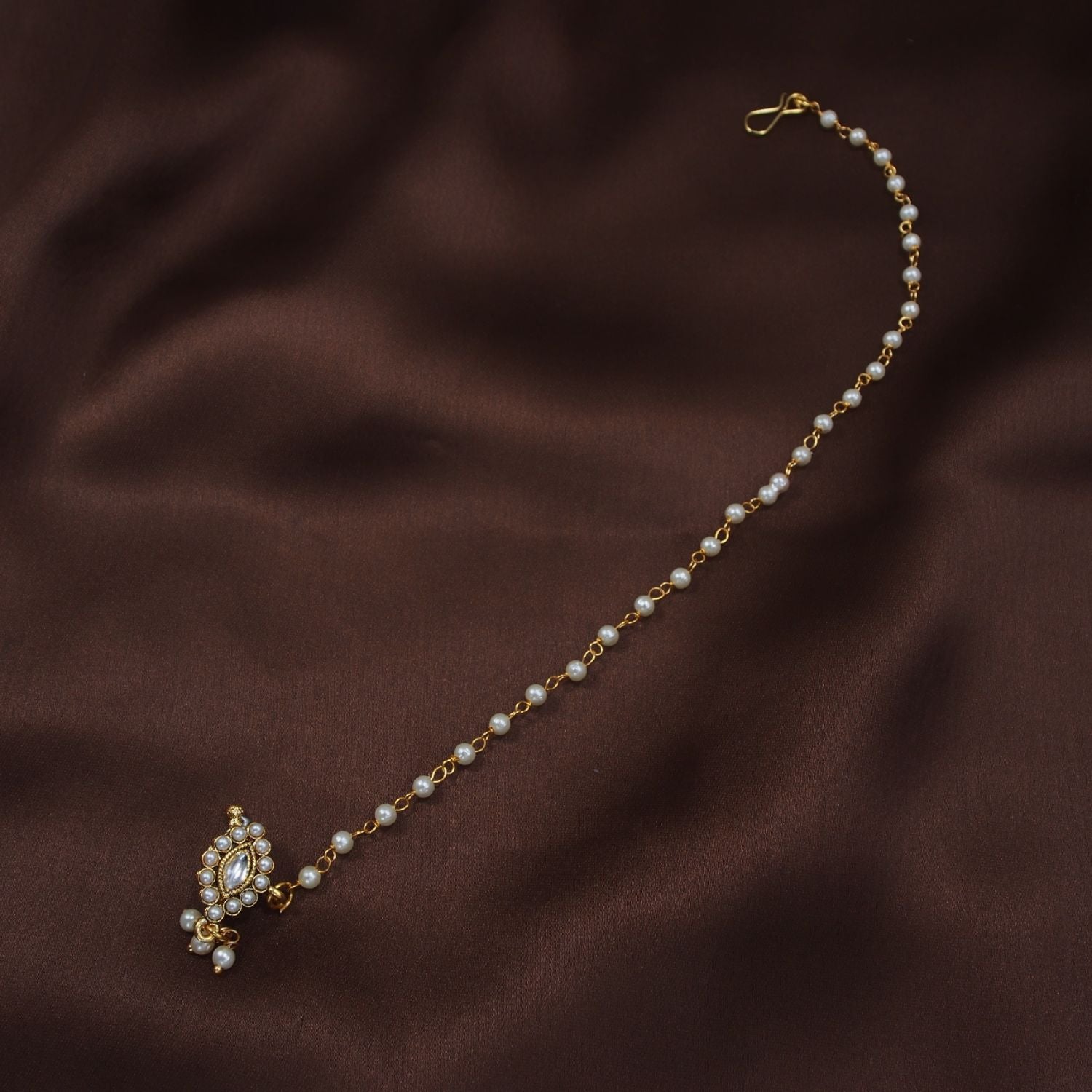 Etnico 18k Gold Plated Traditional Ethnic Bridal Nose Ring/Nath without piercing with Pearl Chain Encased with Pearl Stone for Women/Girls (NL48W)
