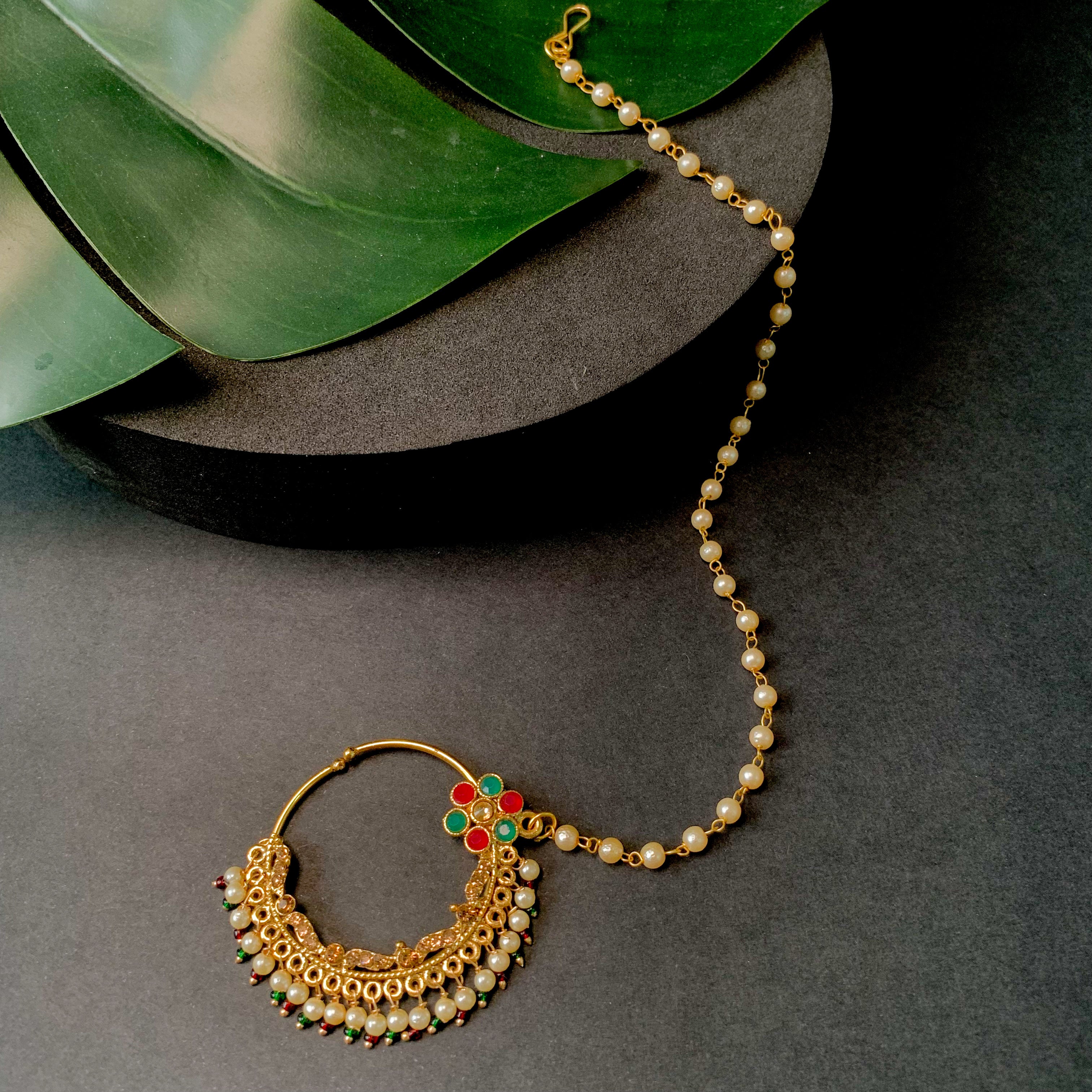 Etnico Gold Plated Traditional Ethnic Bridal Nose Ring/Nath Without Piercing with Pearl Chain Encased with Pearl Stone for Women/Girls (NL65MG)