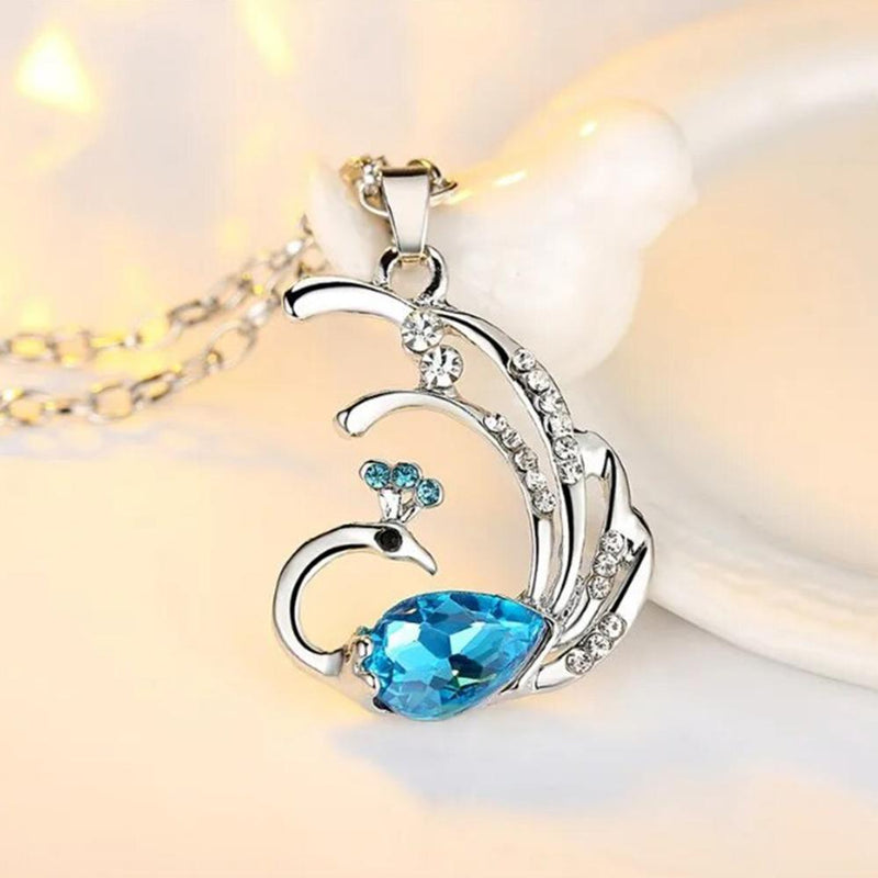 Mahi Dancing Peacock Shaped-Pendant Necklace with Aqua Blue and White Crystals for Women  (PS1101885R)