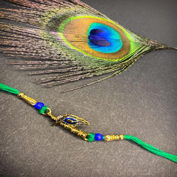 Mahi Krishna Flute, Meena Work Peacock Feather-Shaped Rakshabandhan Rakhi with Crystals for Brother, Bhai, Bro (RA1100753G)