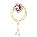 Mahi Multicolor Peacock-Shaped Lumba Rakhi for Bhabhi | Enamel Work Bracelet with Artificial Pearl Chains & Pastel Beads (RAL1100850G)