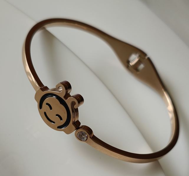 Tarohi Jewels Stainless Steel Rosegold Plated Smiley Face Fancy Kada- STKD 2685