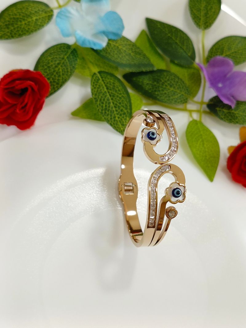 Tarohi Jewels Stainless Steel Rosegold Plated Baguette Evil Eye on Flower Fancy Kada- STKD 4256