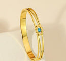 Tarohi Jewels Stainless Steel Gold Plated Evil Eye Kada- STKD 4928