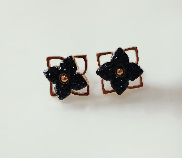 Tarohi Jewels Stainless Steel Rosegold Plated Floral Stud Earring-STNER 2564